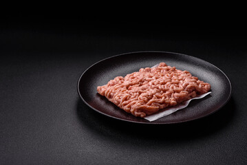 Raw minced chicken with salt, spices and herbs