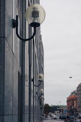 A wall lamp on the side of a building