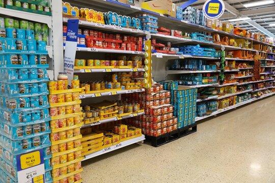LIMERICK, IRELAND - JUNE 30, 2024: Selection of canned beans in a Tesco store in Limerick, Ireland.