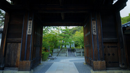 Large, wooden Japanese gate way into park area