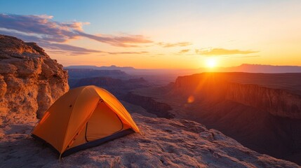 Tent set up on a cliff edge overlooks a vast wilderness at dawn, embodying the spirit of adventure and resilience