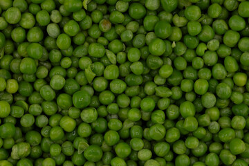 Green Peas. Green background. Peas background. Top view.