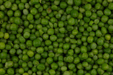 Green Peas. Green background. Peas background. Top view.