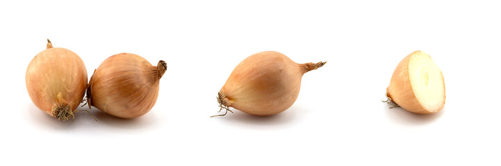 Onion bulbs isolated. Whole golden onion bulb and a half on white background. Onion set. Full depth of field. With clipping path.