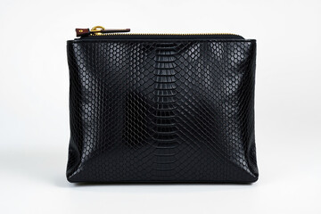 Luxury accessory concept. Close up of black leather clutch isolated on white background. Studio shot