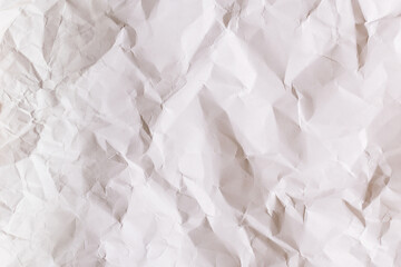 Obraz premium Crumpled white paper background.