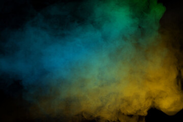 Yellow steam on a black background.