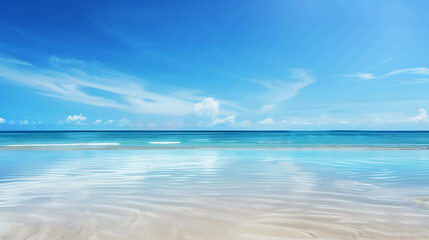 Obraz premium Amazing view of the beach with white sand and blue water. Clear blue sky with some clouds on the horizon.