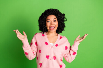 Photo of lovely young lady excited talking raise hands dressed stylish strawberry print pink garment isolated on green color background