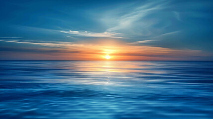 Obraz premium Tranquil seascape with vibrant sunset over the horizon.