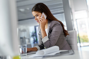 Woman, phone call or thinking in office for business, IT support or problem solving at laptop. Journalist, contact or tech in agency for report update, news feedback or story opportunity for article