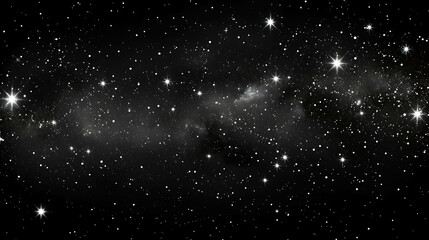 Obraz premium The image is a beautiful night sky filled with stars. The stars are bright and white, and they seem to be twinkling in the distance.