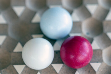 Repetitive geometric shapes wood, background. Triangle collect three. White and red.