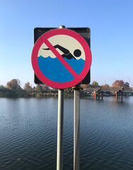 No bathing, no swimming - a prohibition sign erected on the bank of the Nogat River. 