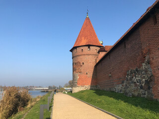 Malbork, Poland - Castel in Malbork, Marienburg as seen from the river Nogat. Teutonic knights architecture in Poland.  