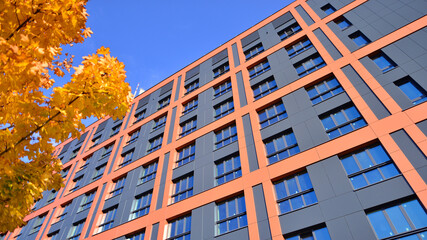 Modern office building with metallic panel facade and windows. Modern architectural details.
