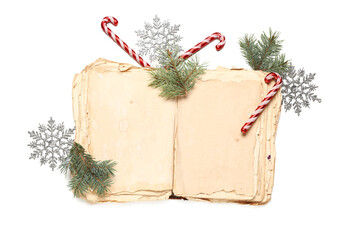 Composition with old open book, fir branches and Christmas decorations on white background