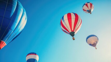 Obraz premium Red, white and blue balls floating in the sky symbolize global unity, health awareness and support for medical initiatives. World Diabetes Day awareness concept. AI.