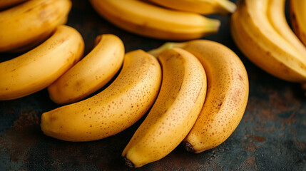 fresh bananas fills the entire frame, showcasing their bright yellow color and smooth texture. Symbolizing energy, abundance, and vitality in a cheerful display