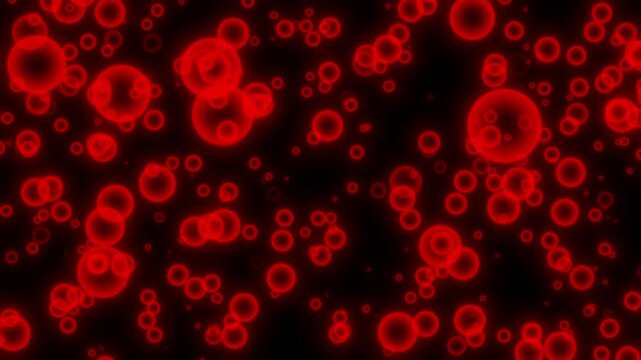 red bubbles moving up on black background