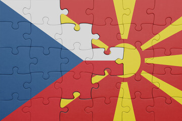 puzzle with the colourful national flag of czech republic and flag of macedonia .