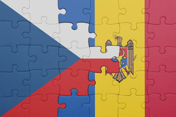 puzzle with the colourful national flag of czech republic and flag of moldova .