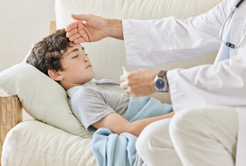 Obraz premium Child, male person and doctor with thermometer, consulting service and medical appointment as kid. Boy, pediatrician and hand on forehead for wellness, checkup or healthcare treatment in consultation
