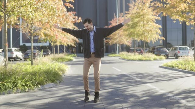 Cheerful Office Worker Celebrates Victory Outdoors