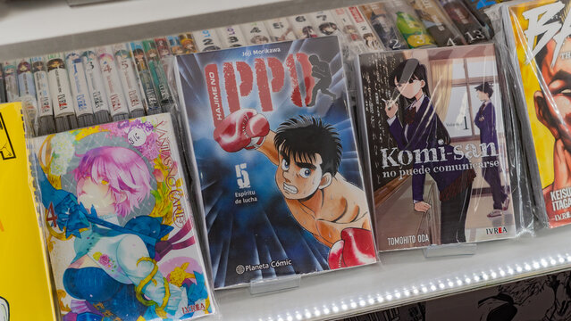 GUAYAQUIL, ECUADOR - JUNE 23, 2024: Close-up of manga volumes on display, including popular titles like &ldquo;Hajime no Ippo&rdquo; and &ldquo;Komi-san Can&rsquo;t Communicate.&rdquo;