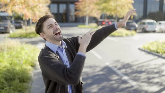 Excited Office Employee Dancing in Urban Setting