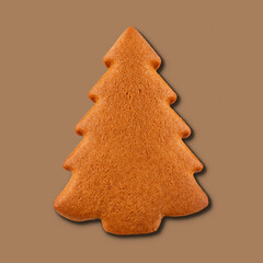 Gingerbread christmas trees isolated on brown background