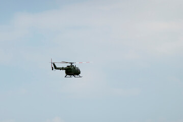 A military helicopter pilot demonstrates the technical skills an