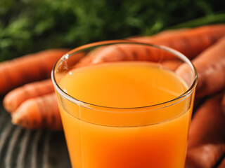 Fresh Orange Carrots from the Garden, Juicy, Organic, and Ripe for a Healthy Vegan Diet