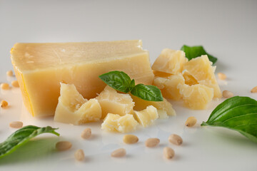 Authentic Italian Parmigiano Reggiano: Aged Cheese Wedge Isolated on White Background