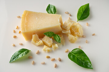 Authentic Italian Parmigiano Reggiano: Aged Cheese Wedge Isolated on White Background