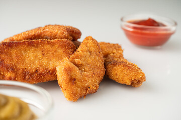 Crispy Chicken Strips with Spicy Mustard and Ketchup Sauces