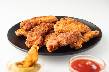 Crispy Chicken Strips with Spicy Mustard and Ketchup Sauces