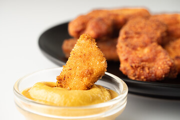 Crispy Chicken Strips with Spicy Mustard and Ketchup Sauces