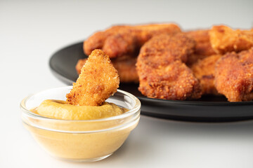 Crispy Chicken Strips with Spicy Mustard and Ketchup Sauces