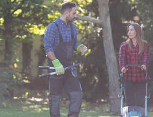 Man and woman working in garden