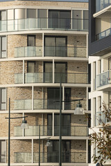 Fototapeta premium Frame filling architectural detail of exterior luxury apartment facade in contemporary architecture Dutch design.