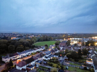 Aerial Footage of Illuminated Residential District Homes at Central Hitchin Town of England Great Britain. The Footage was Captured with Drone's Camera on October 28th, 2023 During Night.