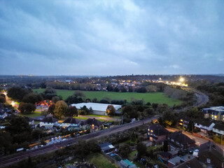 Aerial Footage of Illuminated Residential District Homes at Central Hitchin Town of England Great Britain. The Footage was Captured with Drone's Camera on October 28th, 2023 During Night.
