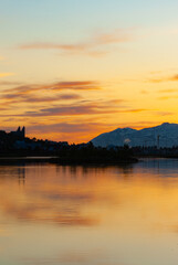 Naklejka premium Akureyri, town in north Iceland in sunset.