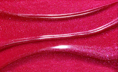 Red shimmering lip gloss texture background. Smudged cosmetic product smear. Makup swatch product sample