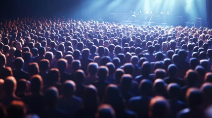 Fototapeta premium Vibrant concert audience under spotlight at live music event
