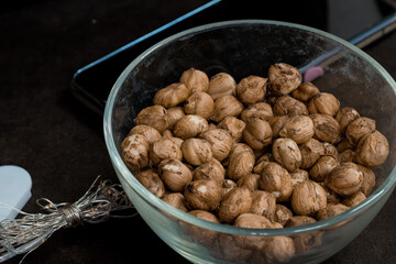 Bowl of Raw Sacha Inchi Seeds on a Dark Table