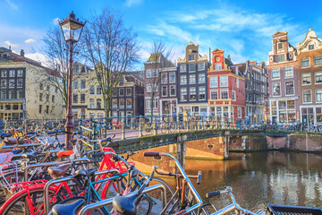 Cityscape on a sunny winter day - view of the bike parking in the historic center of Amsterdam, The...