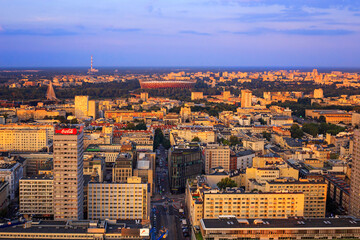 Cityscape at sunset - top view of central Warsaw, the municipal neighbourhood of Centrum, located...