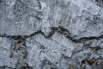 Broken section of old outdoor concrete wall